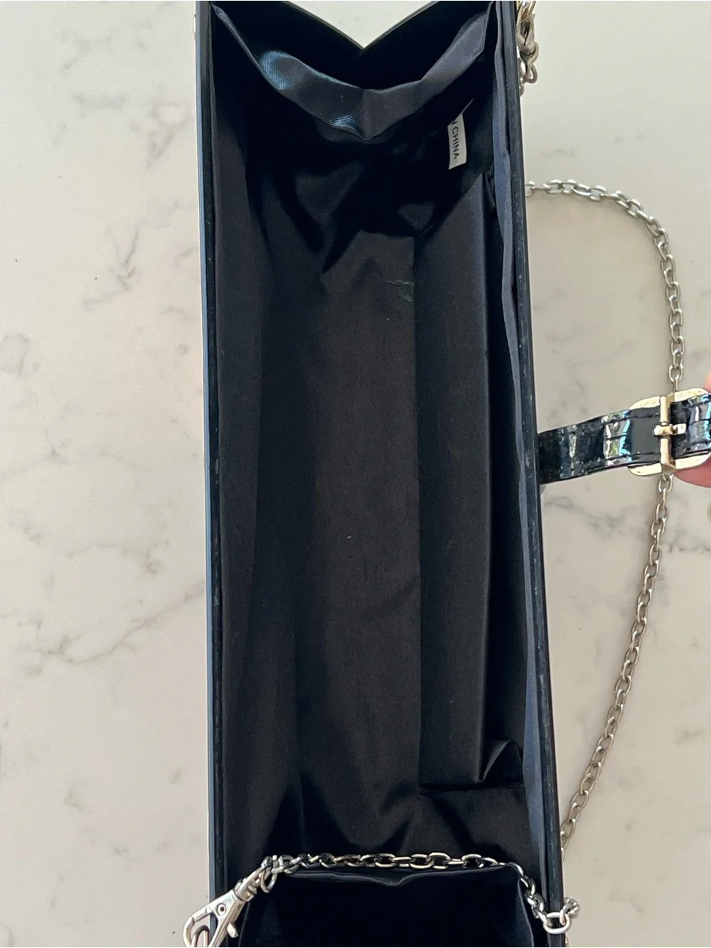 Edgy 80s rolled magazine clutch hard case with crossbody chain red and black